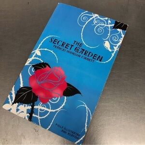 The Secret Garden by: Frances Hodgson Burnett, paperback book